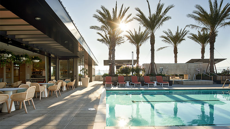 a pool next to a seating area